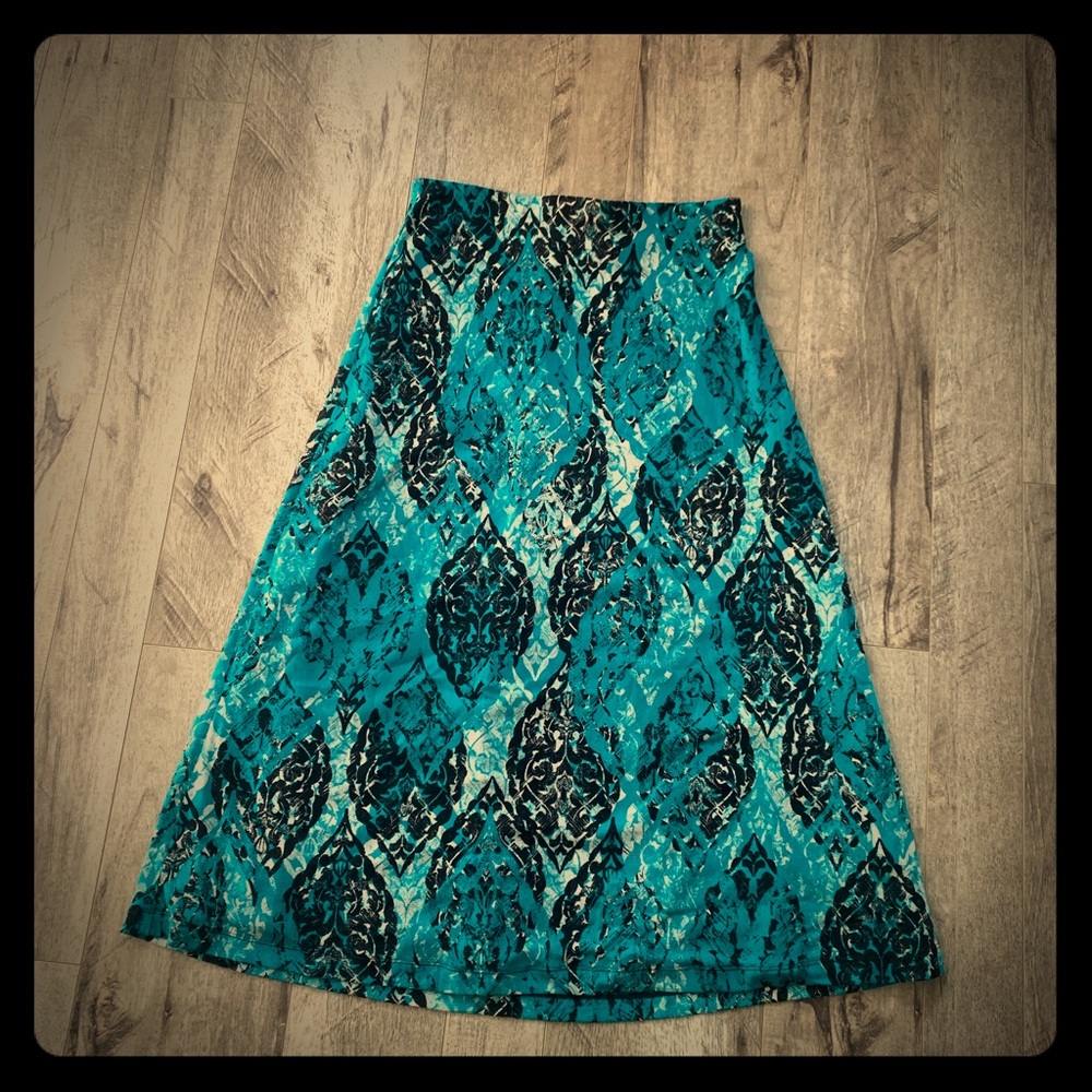 Green, black and white maxi skirt.
